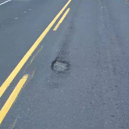 pothole damage with low severity